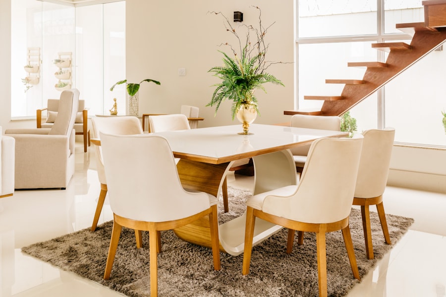 A well-made area rug styled in a dining space, the kind of everyday durability a hand-knotted Bhadohi carpet is built for